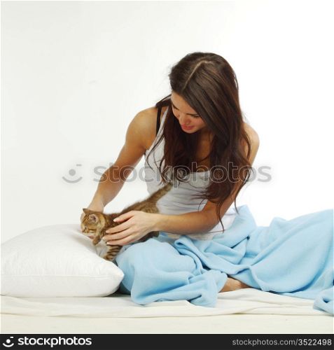 waking woman on the white pillow