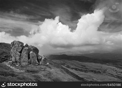 Wales, Gwynedd, Snowdonia . View from Cadair Idris looking North towards Dolgellau over fields and countryside.. Black and white landscape view from Cadair Idris looking North towards Dolgellau over fields and countryside