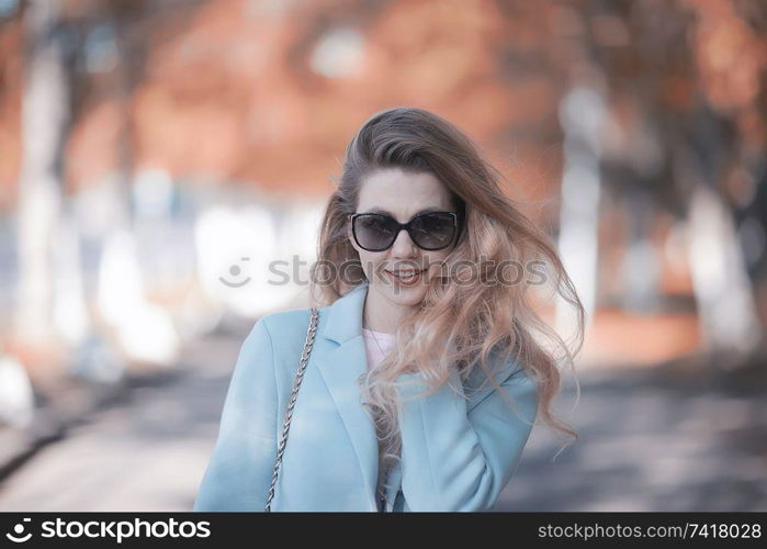 walk in autumn park / beautiful girl in autumn park, model female happiness and fun in yellow trees October