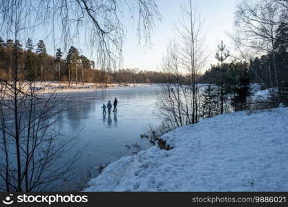 Walk on the ice of the river on a quiet Sunny frosty day, Russia.