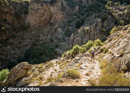 Walkers on the Scala di Santa Regina trail near Corscia in central Corsica