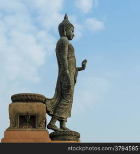 Walking Buddha statue at Phutthamonthon, Thailand