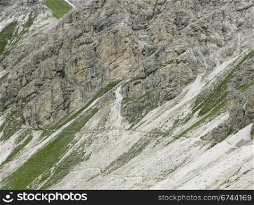 walking path in the alps. small walking path in the alps on a steep slope