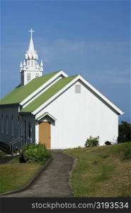 Walkway leading towards a church, St. Benedict&acute;s Catholic Church, Honaunau, Hawaii Islands, USA