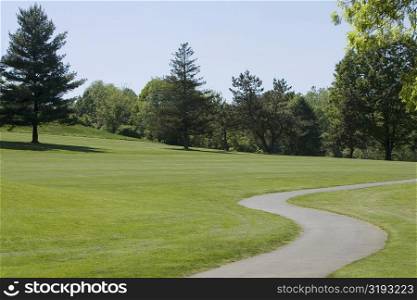 Walkway running through a golf course