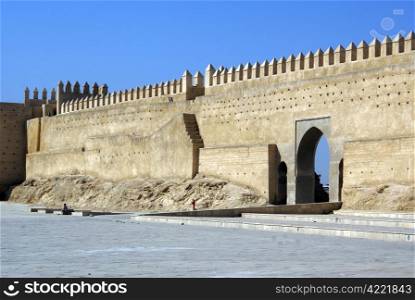 Wall and gate of fortress in Fes, Morocco