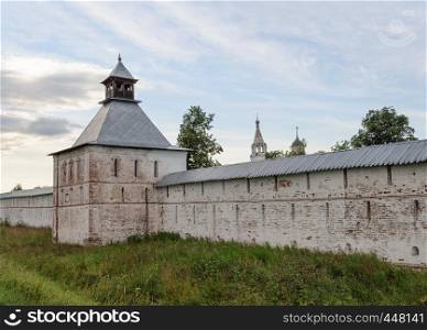 Wall and tower of ancient orthodox Spaso-Prilutsky (Savior-Priluki) Monastery in Vologda, North Russia