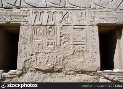 Wall and two windows in Karnak temple in Luxor, Egypt