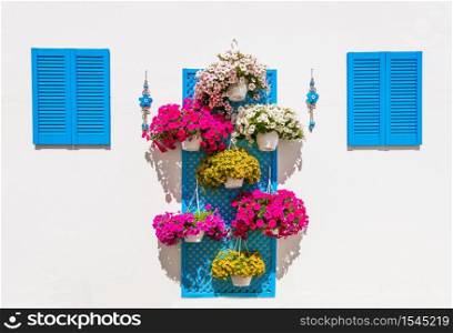wall floral decoration in ethnic style. garden design ideas. Floral wall outside decor