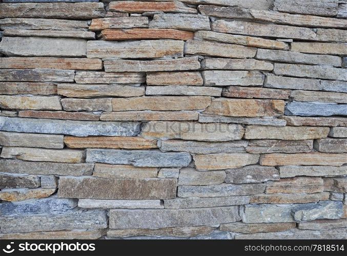 Wall from stone bricks forming a pattern