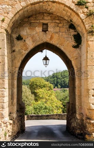 wall gate opened on dordogne valley at domme, perigord noir, aquitaine, france