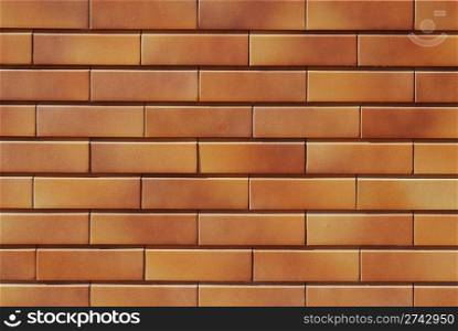 wall made of rectangular orange bricks