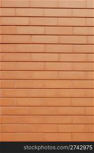 wall made of rectangular orange bricks