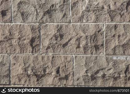 Wall made of the same type and same color of stones