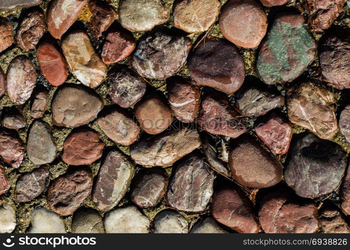 Wall made of the same type and same color of stones