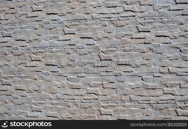 Wall made of the same type of stones. Wall made of the same type and same color of stones