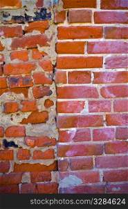 wall of bricks of different shape and colour