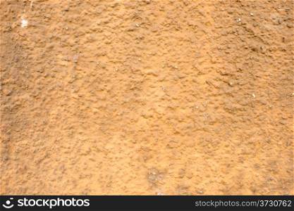 Wall of concrete with brown coating. Wall of concrete with spoiled coating