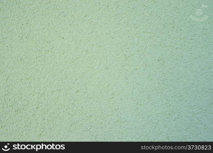 Wall of concrete with green coating. Wall of concrete with coating