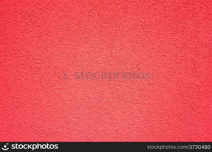 Wall of concrete with red coating
