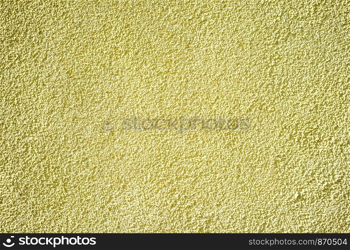 Wall of concrete with yellow coating