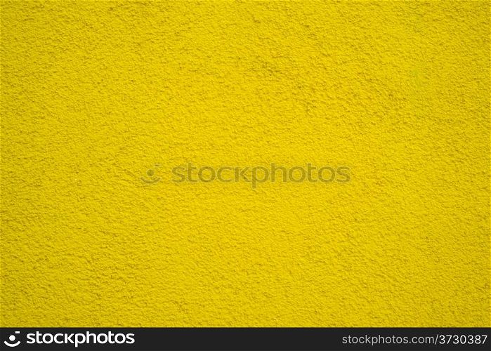 Wall of concrete with yellow coating. Wall of concrete with coating