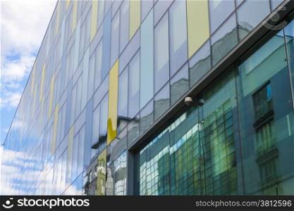 Wall of Glass building with surfeillance camera system