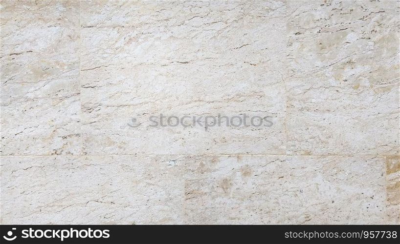 Wall pattern of travertine stone tile background.