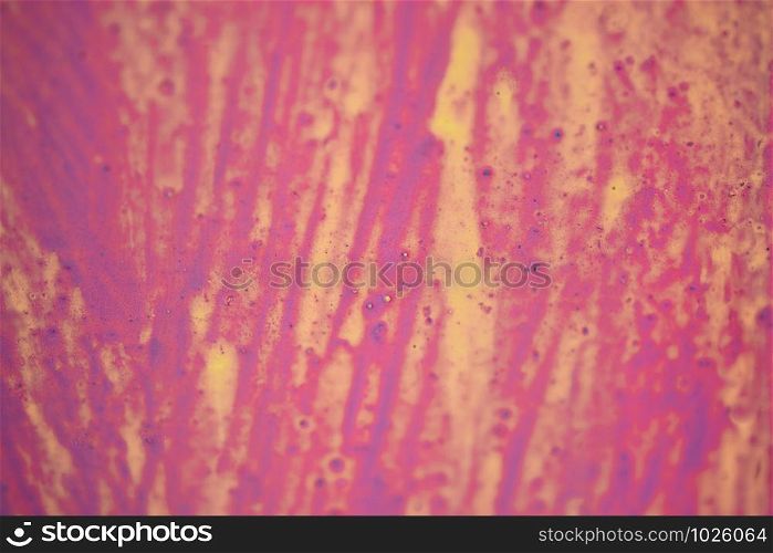 Wall surface painted of various colors as abstract background texture