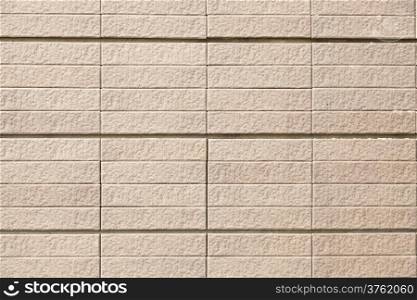 Wall surface russet. Brick tiles as well as small plates.
