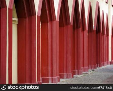 Wall surfaces with red edging. red edging at a Berlin building