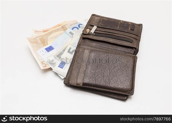 wallet with banknotes on a white background