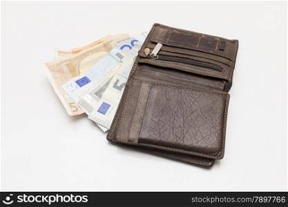 wallet with banknotes on a white background