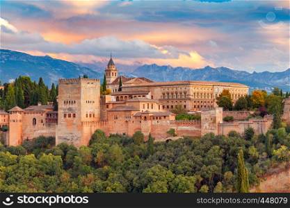 Walls and towers of the fortress of the Alhambra at sunset in Granada. Andalusia. Spain.. Granada. The fortress and palace complex Alhambra.