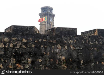 Walls of fort Galle and flag in Sri Lanka