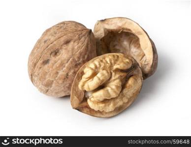 walnut and a cracked walnut isolated on the white background with clipping path
