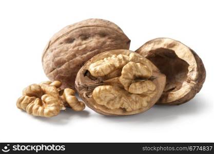 walnut and a cracked walnut isolated on the white background with clipping path