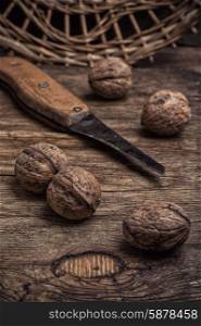walnut. few walnuts on wooden background from autumn harvest.