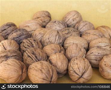 walnut fruit food background. many walnuts with shell useful as a background