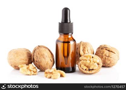 Walnut oil isolated on white background. walnut oil for Cosmetic or beauty care