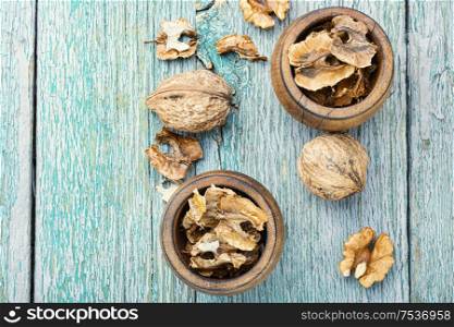 Walnut partitions.Healing properties of walnuts.Healing potion.Medical nutrition.Herbal medicine. Walnut medicinal partitions.