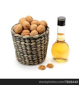 walnuts and oils isolated on white background