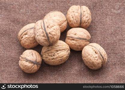 walnuts close up on the burlap background