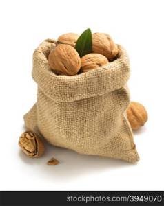 walnuts in bag isolated on white background