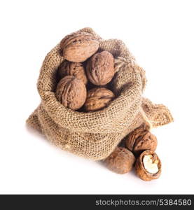 Walnuts in burlap bag isolated on white