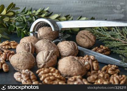 Walnuts on a black background, walnut kernels. Healthy food from walnut. Close-up