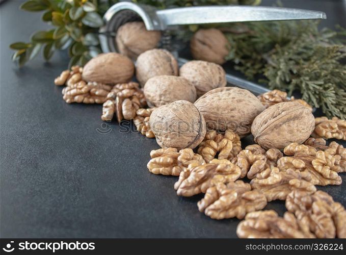 Walnuts on a black background, walnut kernels. Healthy food from walnut. Close-up.. Walnuts on a black background, walnut kernels. Healthy food from walnut.