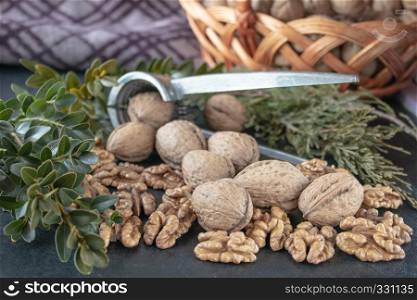Walnuts on a black background, walnut kernels. Healthy food from walnut. Close-up.. Walnuts, walnut kernels. Healthy food from walnut.