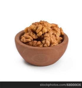 Walnuts shelled in a bowl isolated on white background. Side view. Walnut kernels in a bowl.. Walnuts shelled in a bowl isolated on white background. Side view. Walnut kernels in a bowl