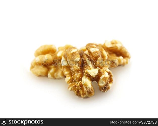 Walnuts towards white. Walnuts in a pile isolated towards white background